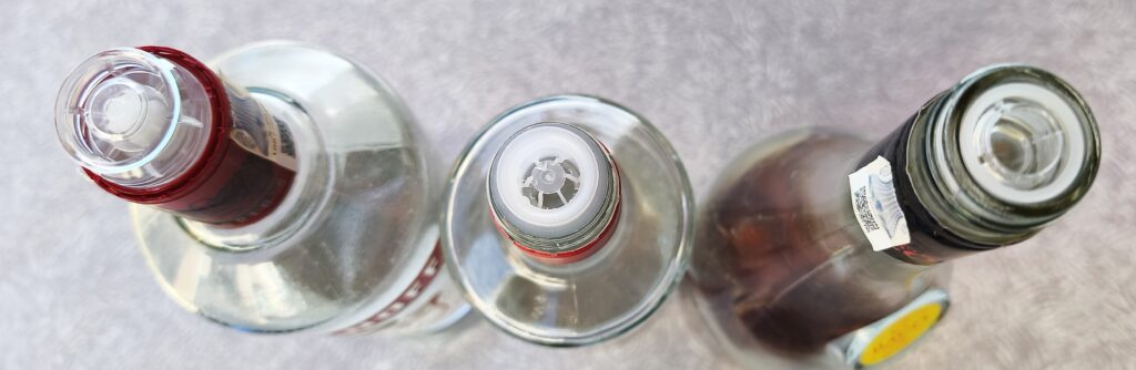 Helletut på spritflasker